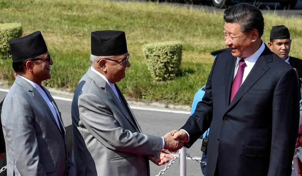 Xi Jinping bids farewell to Nepal's prime minister, KP Sharma Oli, in Kathmandu in October 2019 after a two-day visit to Nepal. Photo: Reuters Xi Jinping bids farewell to Nepal's prime minister, KP Sharma Oli, in Kathmandu in October 2019 after a two-day visit to Nepal. Photo: Reuters