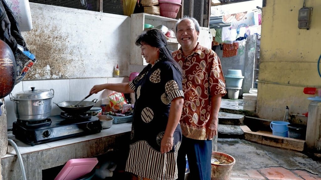 Sutikno charges each household a monthly caretaking fee of about US$1. Photo: Witness News/Lukman Abdul Rozaq