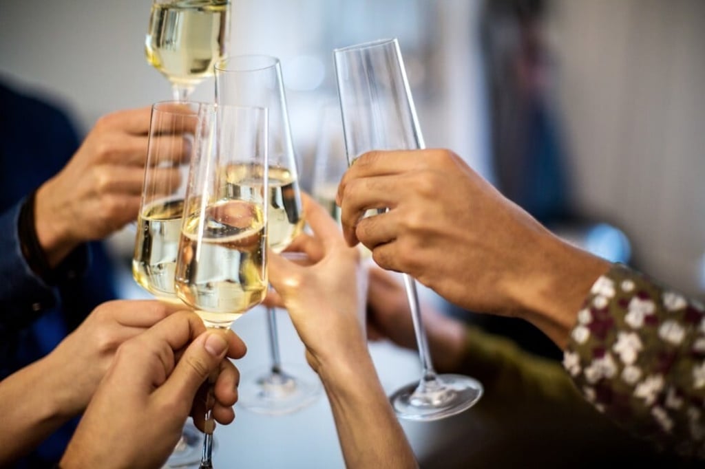 Raising a toast – to the end of a difficult year perhaps? Photo: Getty