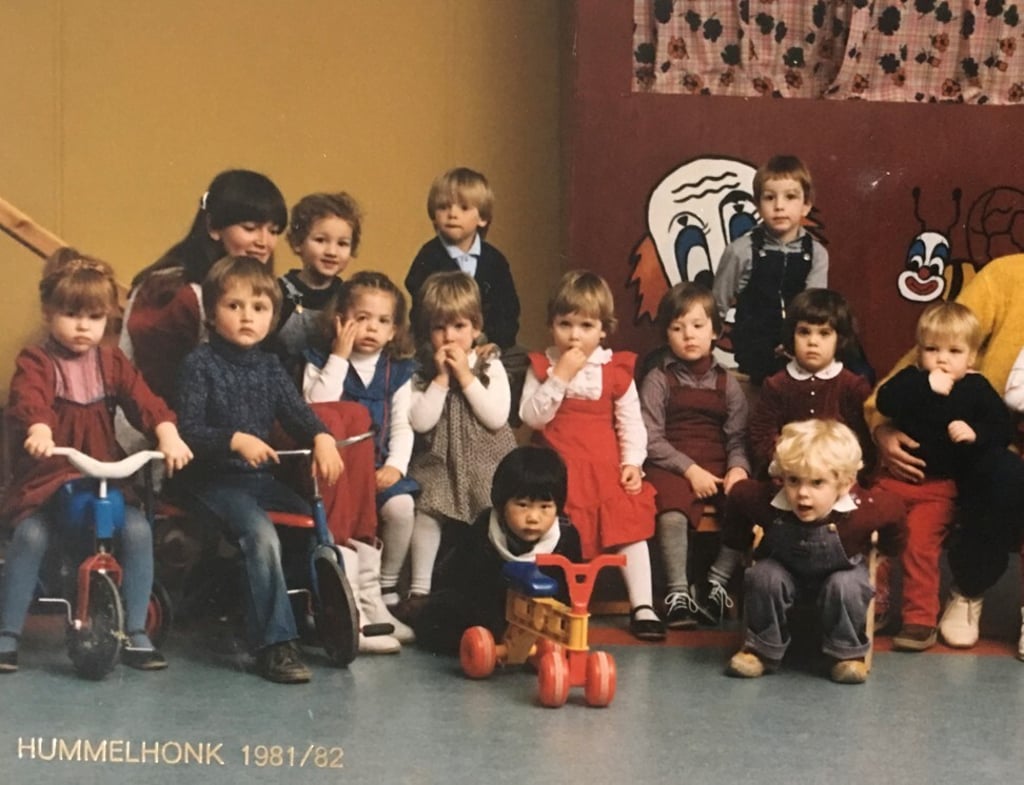 Huihan Lie, in front with red toy bike, in a school photo with his Dutch classmates when he was younger. Photo: Handout