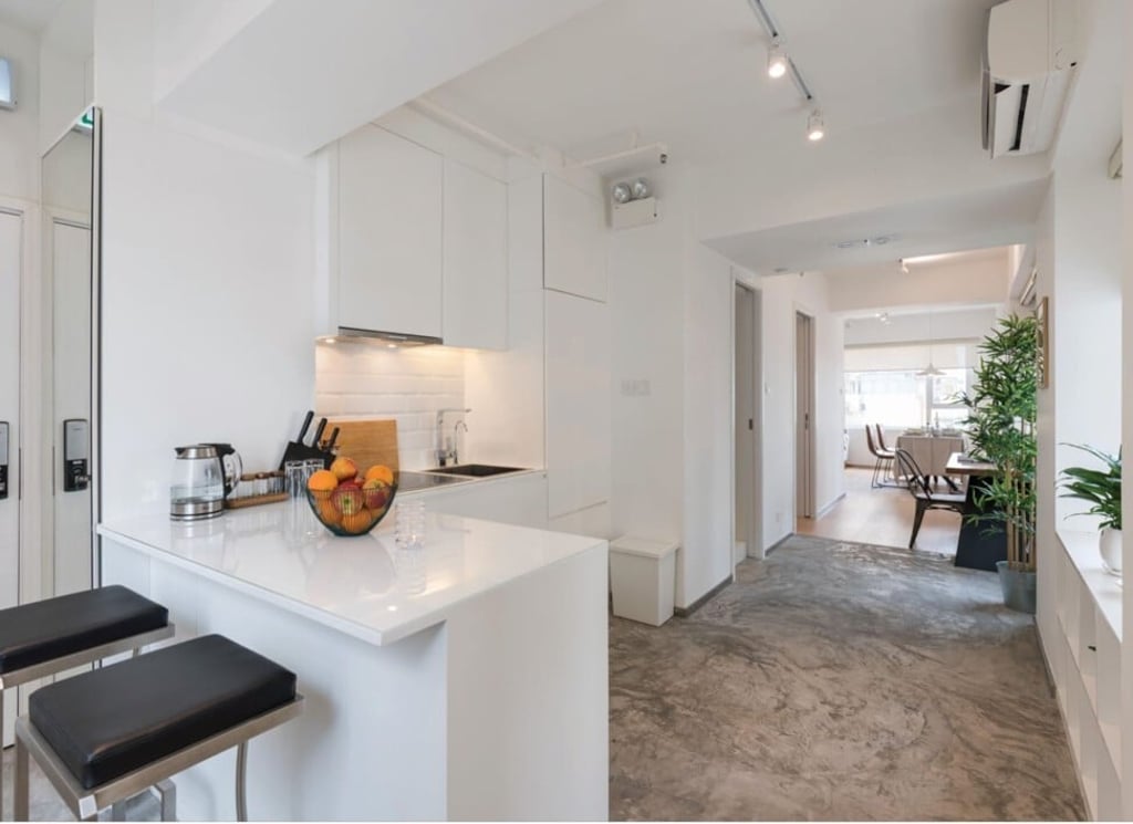 A contemporary kitchen in white by The Editor’s Company. Photo: The editor’s company