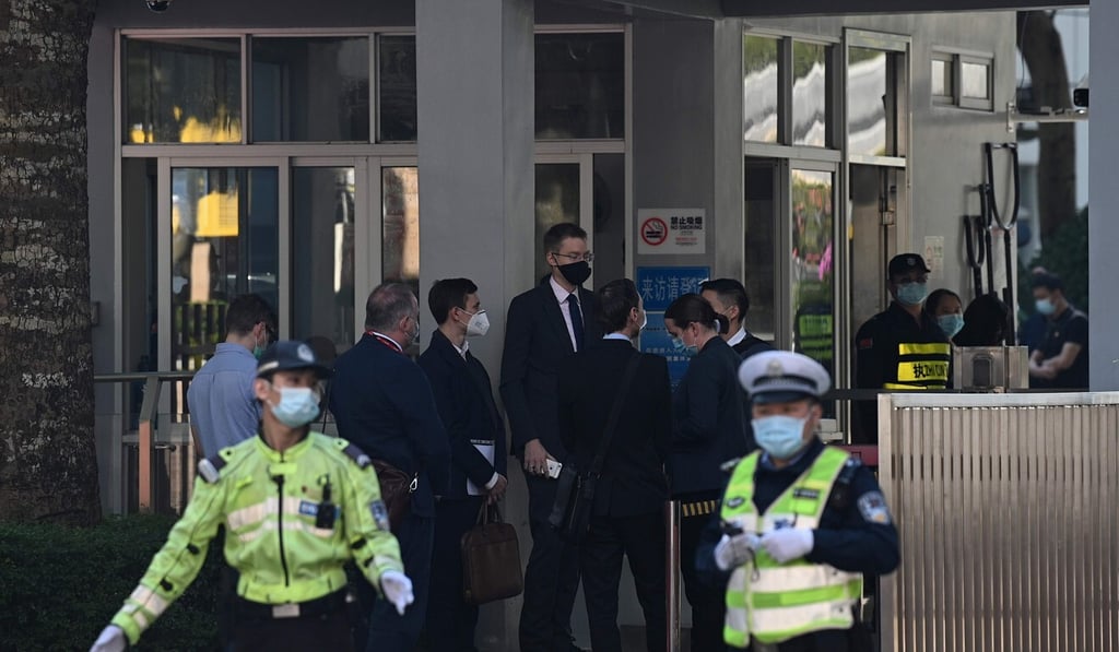 Diplomats from the US, Britain, Australia, Canada, Portugal and the Netherlands wait outside the Yantian District People’s Court after being denied entry to last week’s trial. Photo: AFP Diplomats from the US, Britain, Australia, Canada, Portugal and the Netherlands wait outside the Yantian District People’s Court after being denied entry to last week’s trial. Photo: AFP