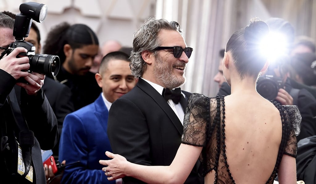 Joaquin Phoenix (left) and Rooney Mara arrive at Oscars 2020. Photo: Jordan Strauss/Invision/AP