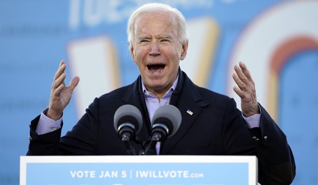 US President-elect Joe Biden speaks in Atlanta on Monday as he campaigns for Senate candidates Raphael Warnock and Jon Ossoff. Photo: AP US President-elect Joe Biden speaks in Atlanta on Monday as he campaigns for Senate candidates Raphael Warnock and Jon Ossoff. Photo: AP