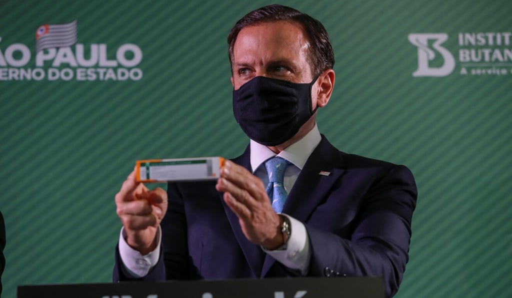 Sao Paulo’s state governor, Joao Doria, holds a box of Sinovac’s Covid-19 vaccine during a news conference about its efficacy results on Thursday. Photo: Reuters Sao Paulo’s state governor, Joao Doria, holds a box of Sinovac’s Covid-19 vaccine during a news conference about its efficacy results on Thursday. Photo: Reuters