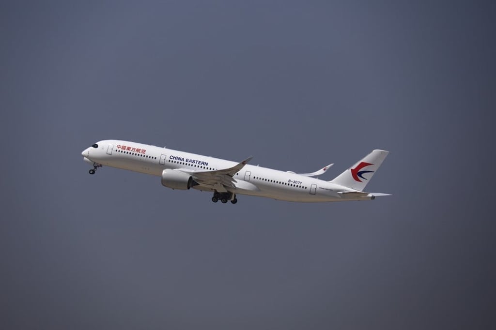 An airliner takes off from Beijing. Travel promotions, such as China Eastern Airlines’ pass allowing unlimited flights within China, will be popular this year as airlines encourage more people to book flights. Photo: Getty Images