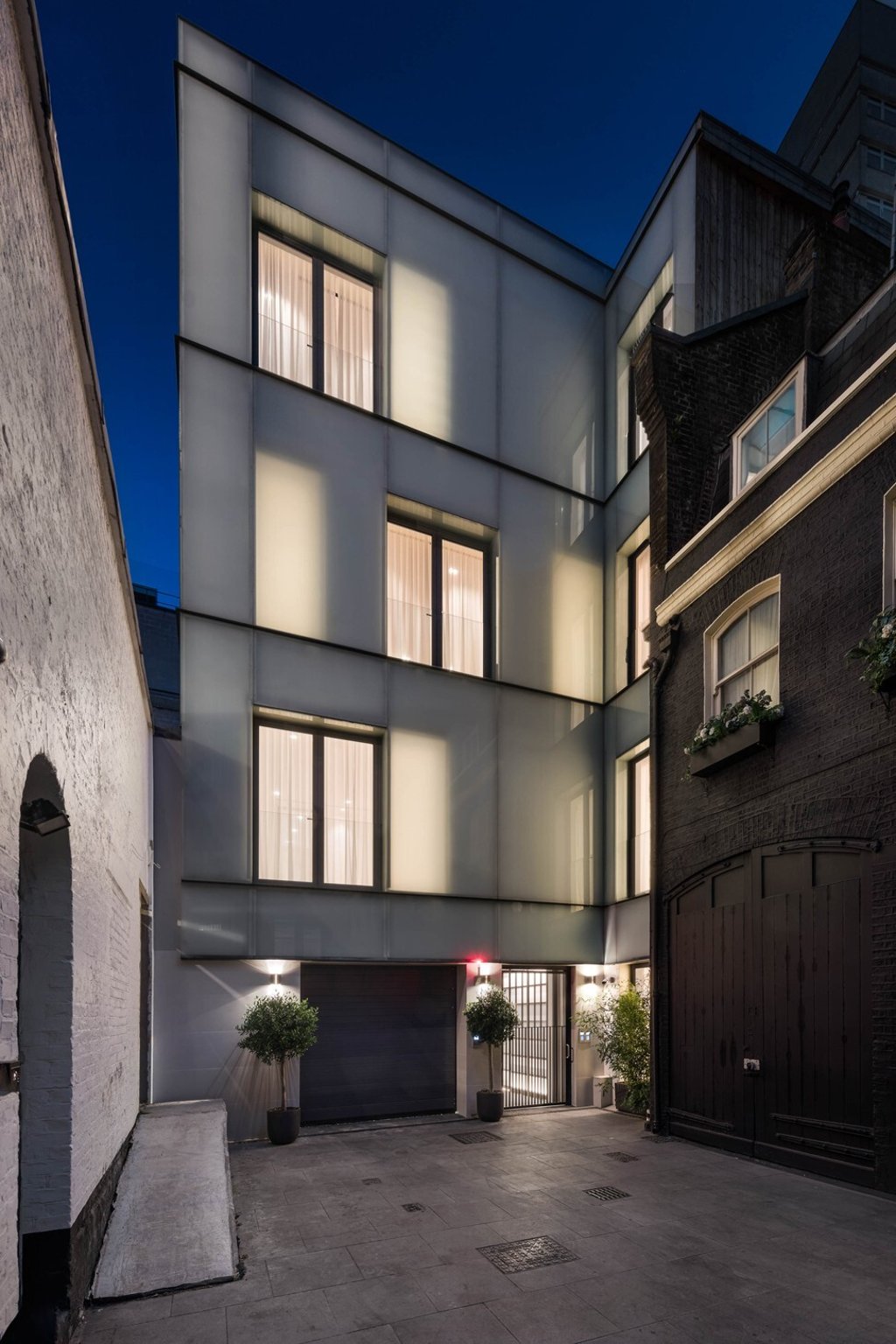 Uber-luxe Glass Mansion on Down Street Mews in London’s Mayfair has a hi-tech garage with four-vehicle stacker. Photo: Beauchamp Estates Uber-luxe Glass Mansion on Down Street Mews in London’s Mayfair has a hi-tech garage with four-vehicle stacker. Photo: Beauchamp Estates