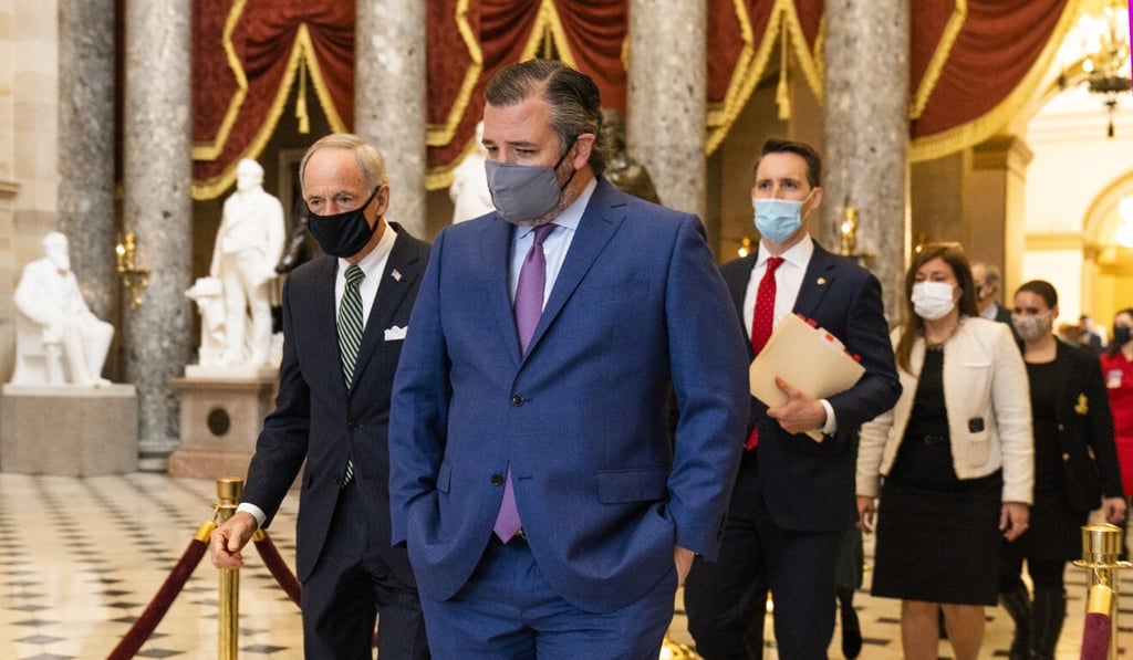 Senator Ted Cruz followed by Senator Josh Hawley in Washington on Wednesday. Photo: AP Senator Ted Cruz followed by Senator Josh Hawley in Washington on Wednesday. Photo: AP