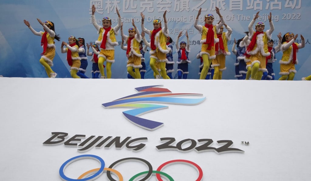 Performers dance during a ceremony to mark the arrival of the Olympic flag and start of the flag tour for the Winter Olympic Games Beijing 2022 at a section of the Great Wall of China on the outskirts of Beijing in 2018. Photo: AP