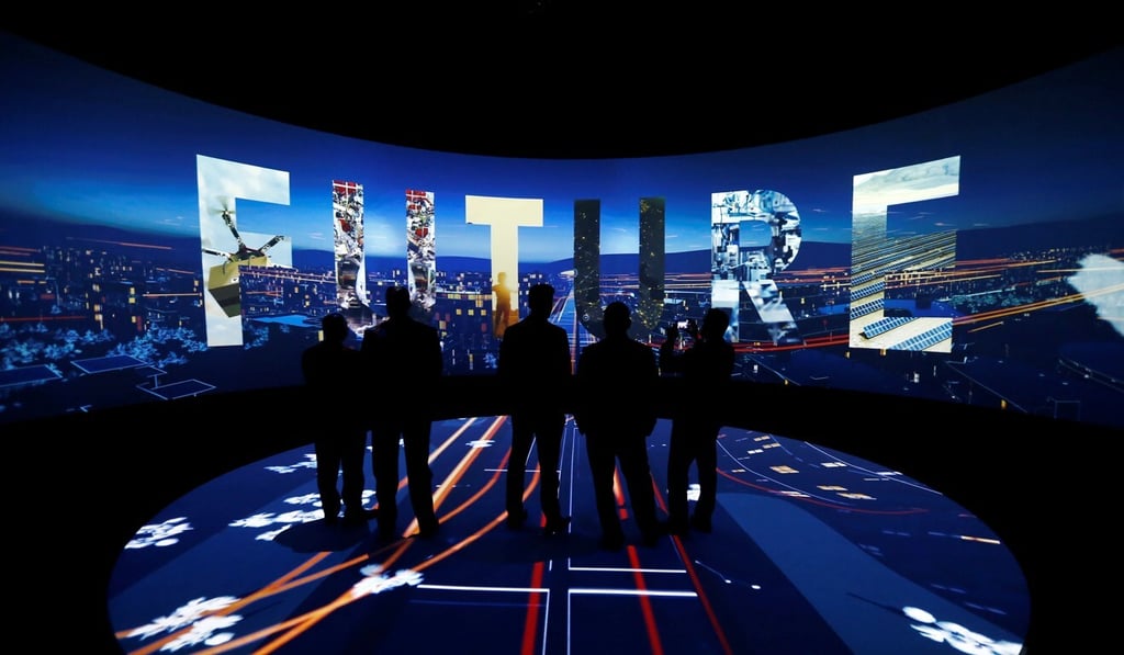 Visitors watch a 3D presentation in Riyadh, Saudi Arabia during an exhibition on the ‘Neom’ project in October 2017. Photo: Reuters