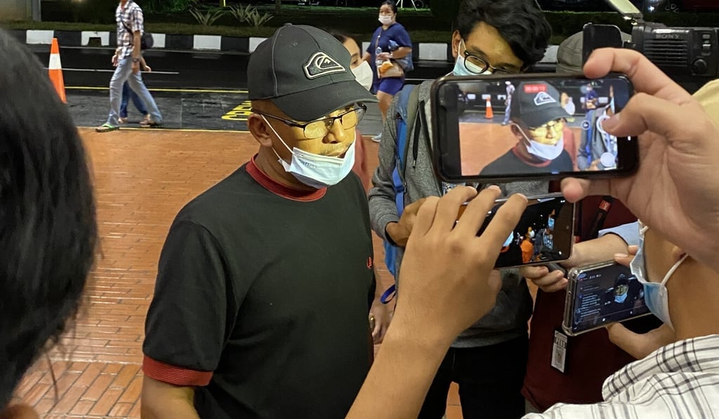 Suyitno speaks to reporters outside a crisis centre at Jakarta airport after discovering his nephew was one of the 62 passengers on board the doomed jet. Photo: Resty Woro Yuniar