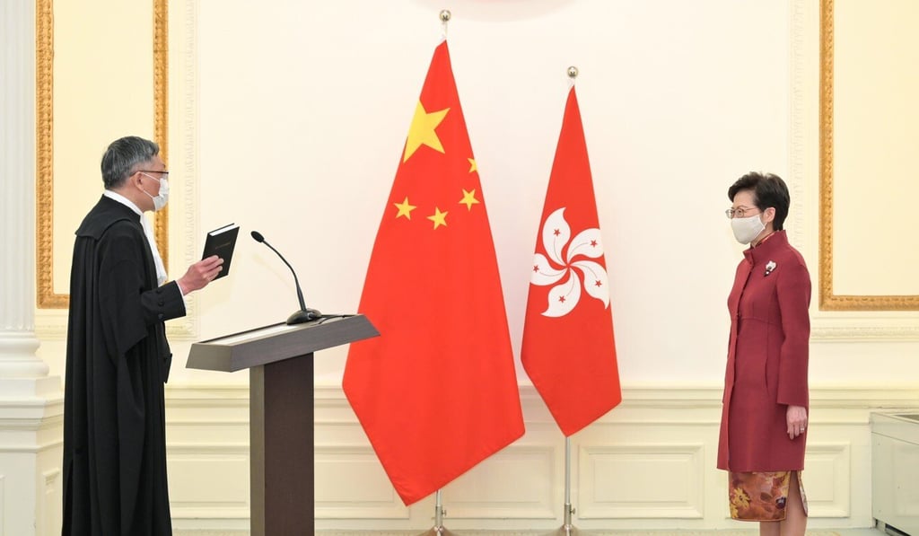 New Chief Justice Andrew Cheung takes his oath of office in front of Chief Executive Carrie Lam on Monday. Photo: Handout New Chief Justice Andrew Cheung takes his oath of office in front of Chief Executive Carrie Lam on Monday. Photo: Handout