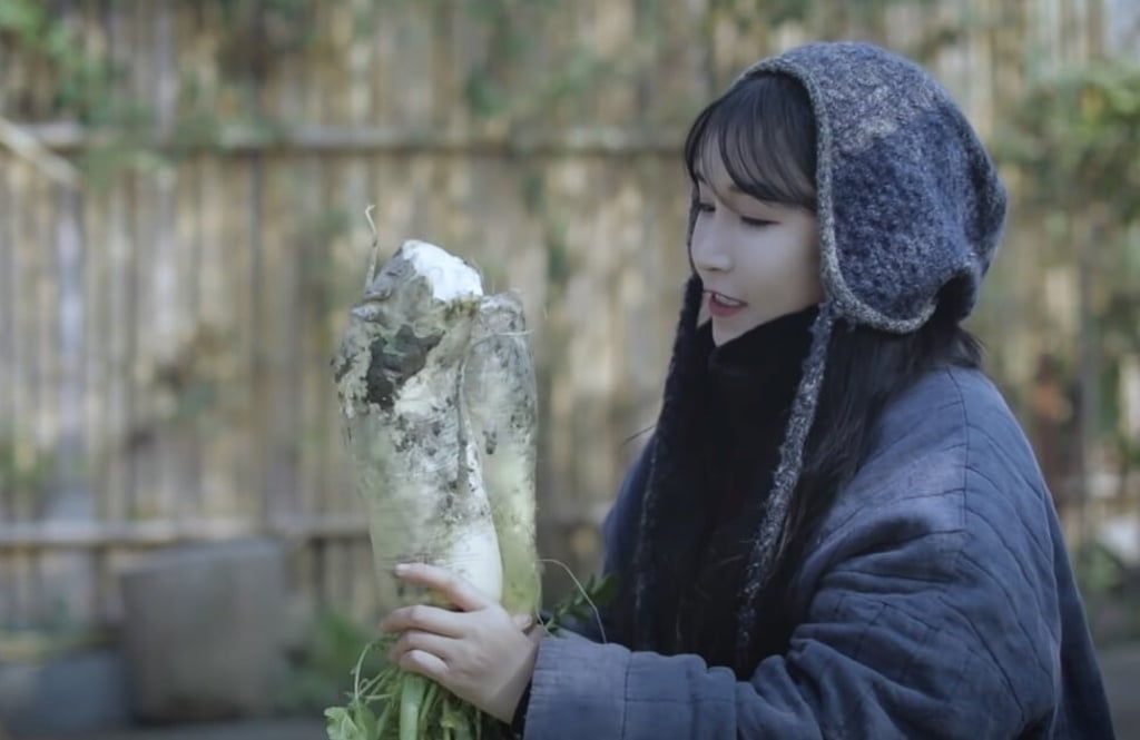 In Li’s newest video, she shows how to pickle cabbage with bok choy, radish and sausages. Photo: YouTube/Li Ziqi