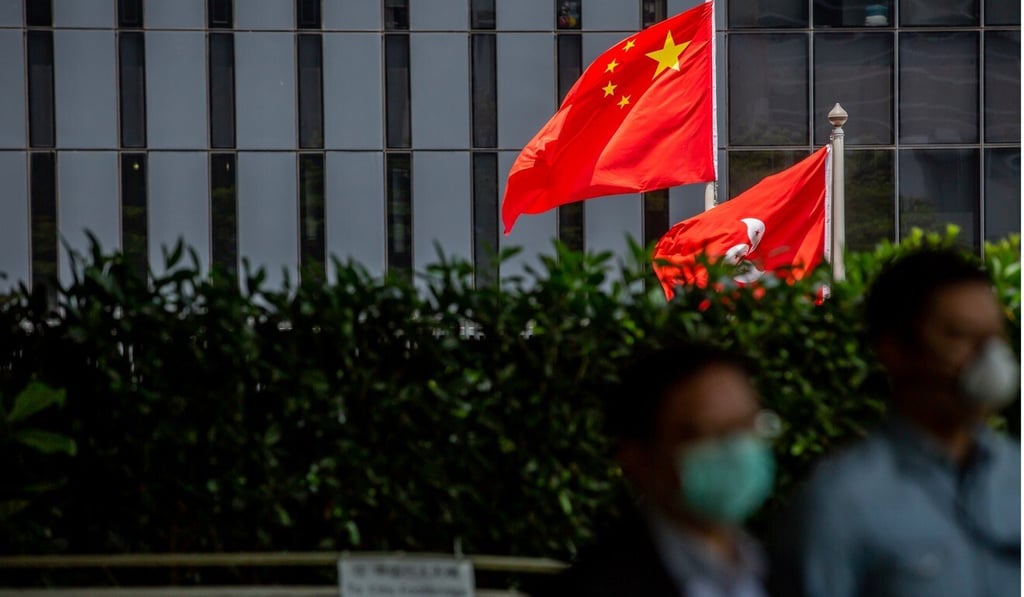 Officials may have to choose between keeping their BN(O) passports and keeping their jobs. Photo: Bloomberg