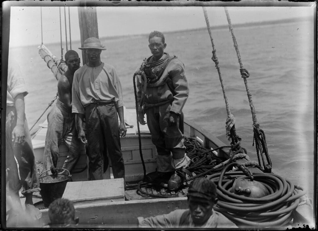 Indigenous divers on a pearl boat in northwest Western Australia, circa 1898. Photo: State Library of Western Australia