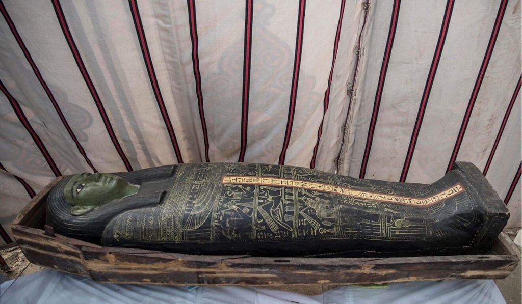 A sarcophagus is displayed during the official announcement on Sunday of the discovery of a new trove of treasures at Egypt‘s Saqqara necropolis south of Cairo. Photo: AFP