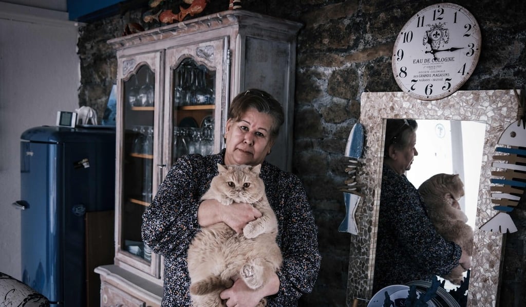 Jeanne Pouchain and her cat. Photo: AFP Jeanne Pouchain and her cat. Photo: AFP