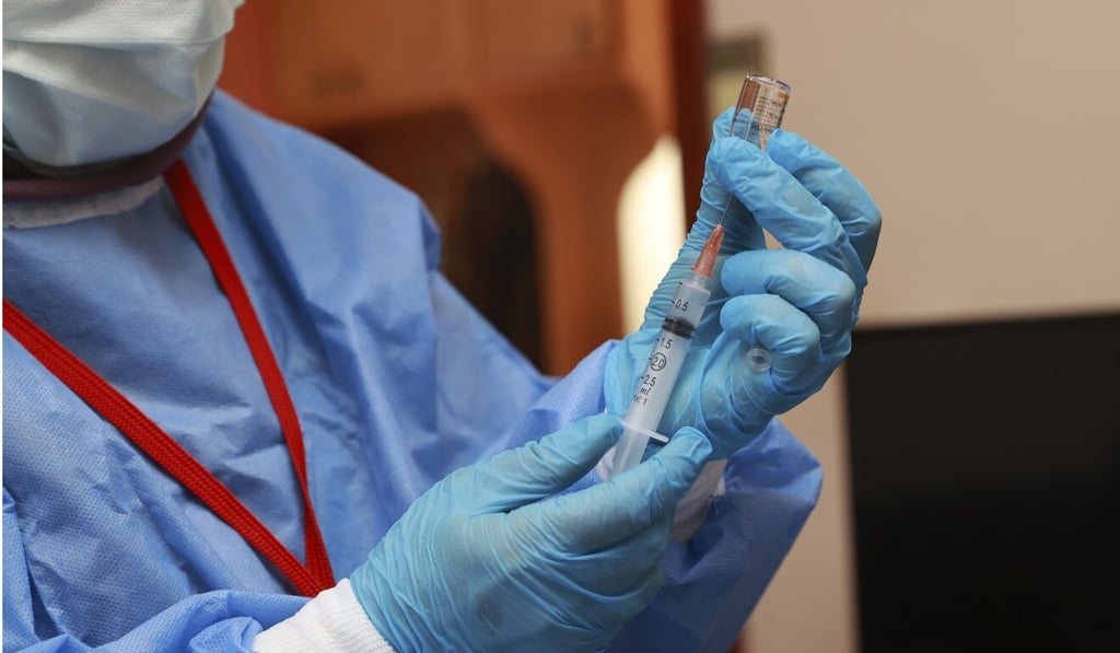 A Turkish health worker prepares a dose of the CoronaVac vaccine. Photo: AP A Turkish health worker prepares a dose of the CoronaVac vaccine. Photo: AP