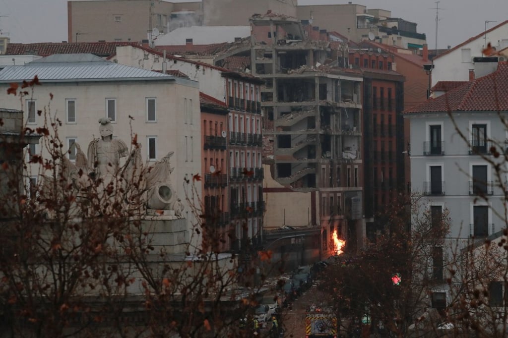 A building belonging to the Catholic Church burns after a deadly explosion in Madrid, Spain on Wednesday. Photo: Reuters A building belonging to the Catholic Church burns after a deadly explosion in Madrid, Spain on Wednesday. Photo: Reuters