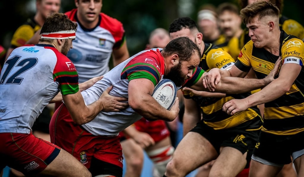 HKU Sandy Bay star Luke van der Smit charges into Tigers’ defensive line in the Premiership round three in December 2020. Photo: Ike Images