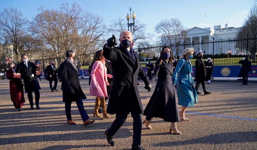 US President Joe Biden and first lady Jill Biden walk to the White House. Photo: EPA