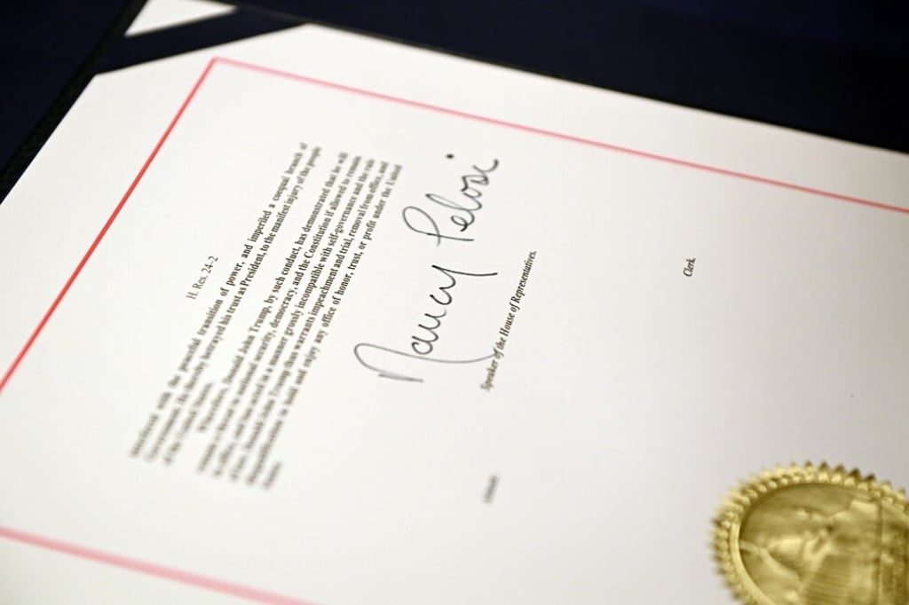 The signature of House Speaker Nancy Pelosi is seen on the article of impeachment. Photo: AFP