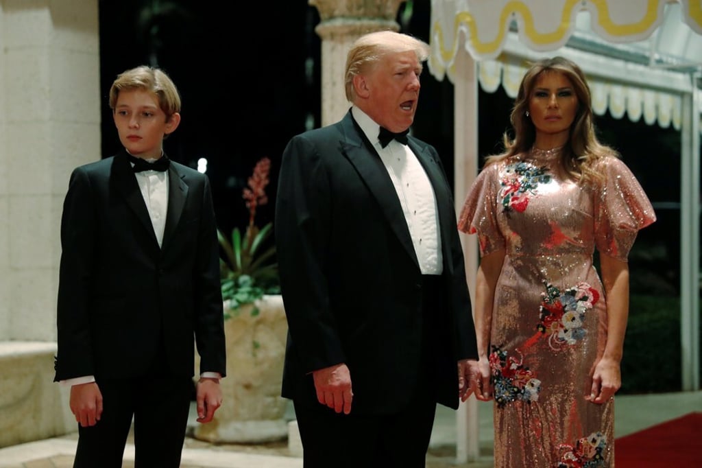 Former US President Donald Trump, Melania and son Barron arriving for a New Year's Eve party at Mar-a-Lago in 2017. Photo: Reuters