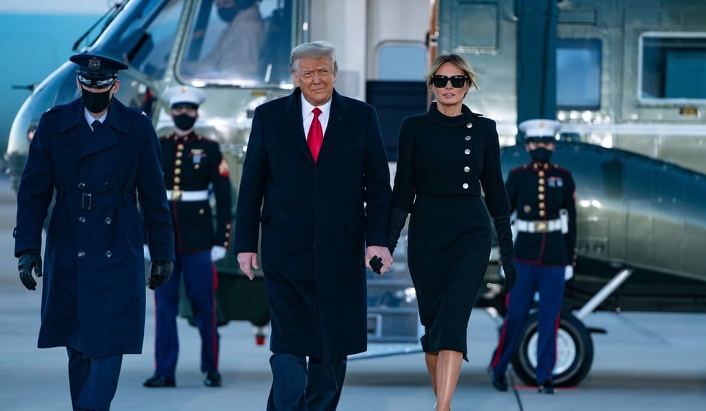 Donald Trump and first lady Melania Trump step out of Marine One at Joint Base Andrews in Maryland on their way to Florida on January 20. Melania wore a black Chanel jacket and Dolce & Gabbana dress, which she later changed out of aboard Air Force One. Photo: AFP