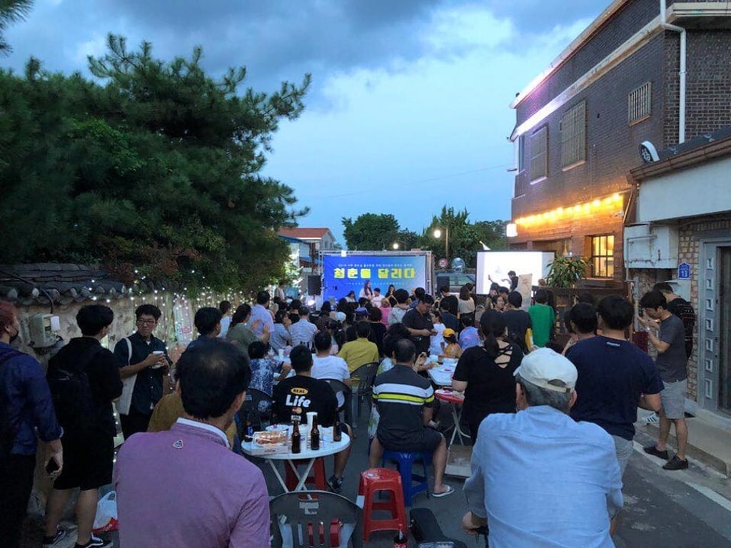 A NiNaNo Planning social event on the street Youth Alley cafe anchors. Photo: Handout A NiNaNo Planning social event on the street Youth Alley cafe anchors. Photo: Handout