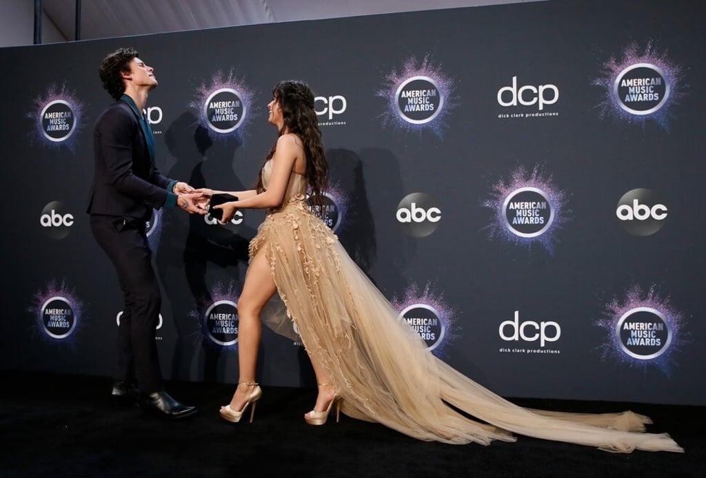 Shawn Mendes and Camila Cabello pose with their award for collaboration of the year for Senorita at the 2019 American Music Awards in Los Angeles, California. Photo: Reuters Shawn Mendes and Camila Cabello pose with their award for collaboration of the year for Senorita at the 2019 American Music Awards in Los Angeles, California. Photo: Reuters