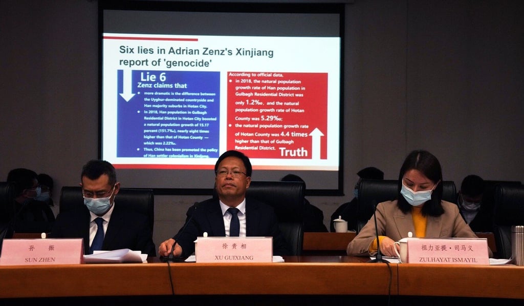 A deputy spokesman for the Xinjiang regional government refutes claims of genocide at a press conference held in Beijing earlier this month. Photo: AP