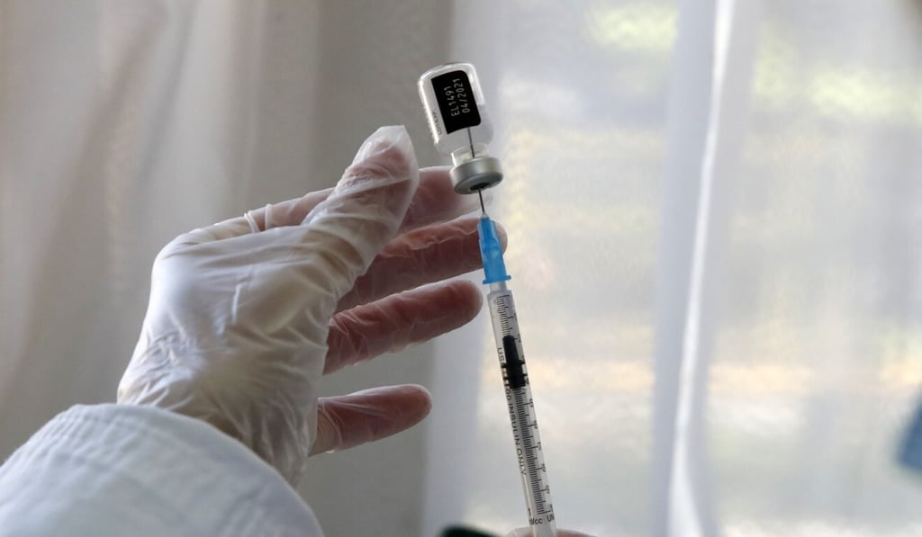 A nurse in Greece prepares a dose of the Pfizer-BioNTech vaccine against Covid-19. Hong Kong authorities formally approved the vaccine on Monday. Photo: AP