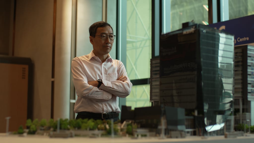 Albert Wong, CEO of Hong Kong Science and Technology Parks Corporation, inspects a model of the Advanced Manufacturing Centre, which is currently under construction and slated to open in 2022. Albert Wong, CEO of Hong Kong Science and Technology Parks Corporation, inspects a model of the Advanced Manufacturing Centre, which is currently under construction and slated to open in 2022.