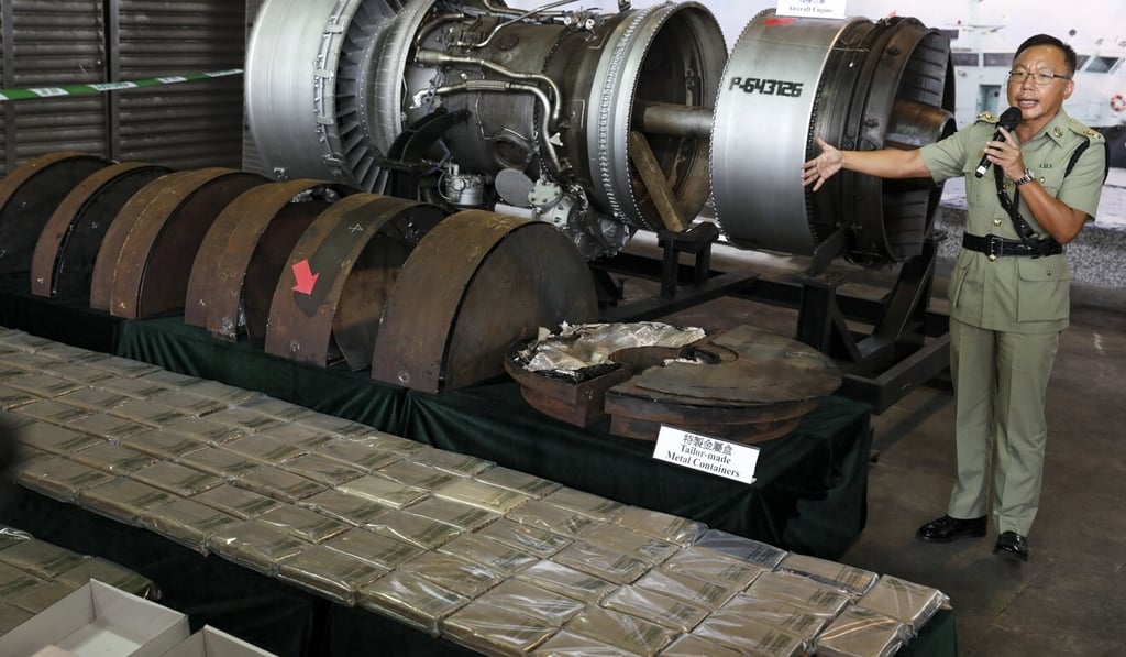An official discusses the seizure of some HK$246 million worth of cocaine found hidden in an aircraft engine shipped from South America last year. Photo: Nora Tam