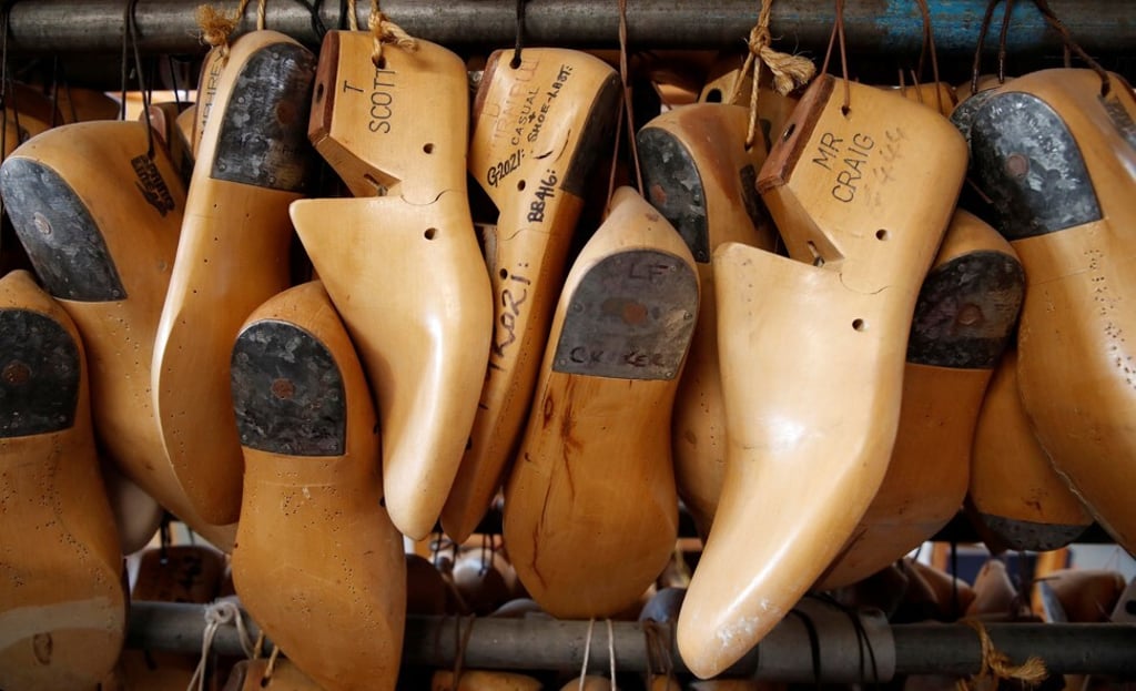 Wooden shoe moulds for various customers at the Tricker’s factory in Northampton, England. Photo: Reuters Wooden shoe moulds for various customers at the Tricker’s factory in Northampton, England. Photo: Reuters