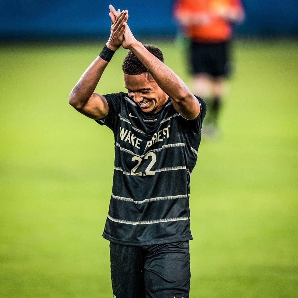 Calvin Harris applauds the Wake Forest fans after another college game in Winston-Salem, North Carolina.