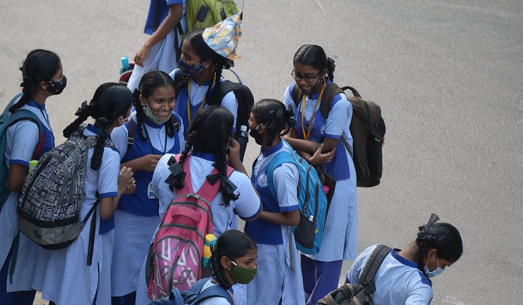 Students in Hyderabad gather after schools reopened nearly 10 months after the spread of Covid-19. Photo: AFP