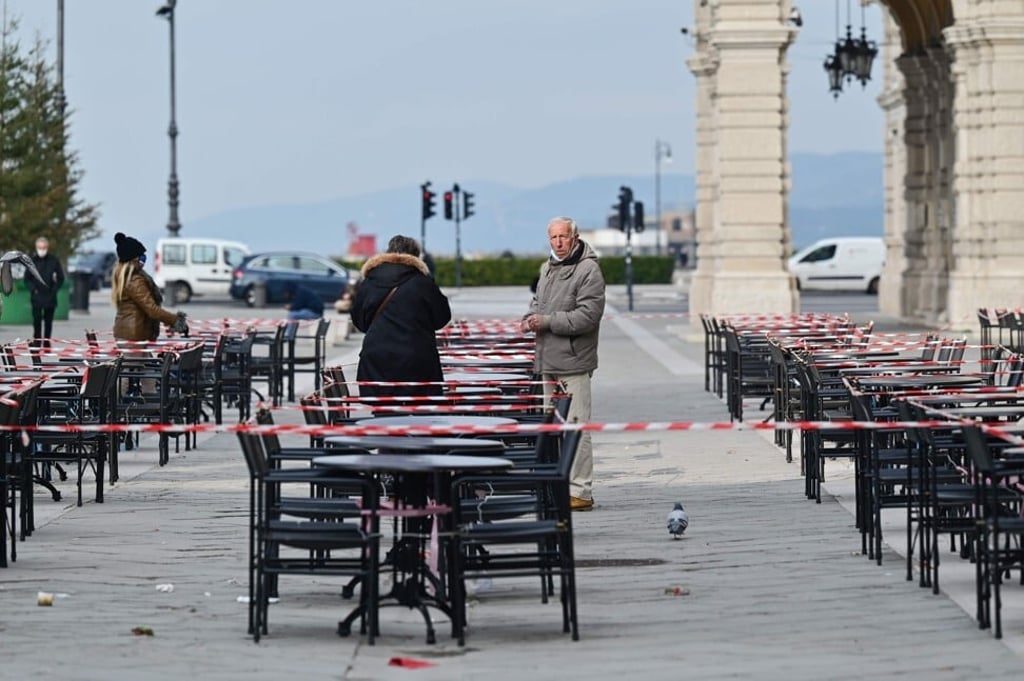 A bar terrace surrounded with security tape in Trieste, Italy on January 19, 2021. Photo: Miguel Medina/AFP A bar terrace surrounded with security tape in Trieste, Italy on January 19, 2021. Photo: Miguel Medina/AFP