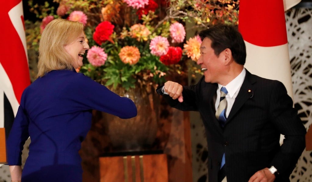 Britain’s International Trade Secretary Elizabeth Truss and Japanese Foreign Minister Toshimitsu Motegi pictured in Tokyo on October 23. Photo: Reuters Britain’s International Trade Secretary Elizabeth Truss and Japanese Foreign Minister Toshimitsu Motegi pictured in Tokyo on October 23. Photo: Reuters
