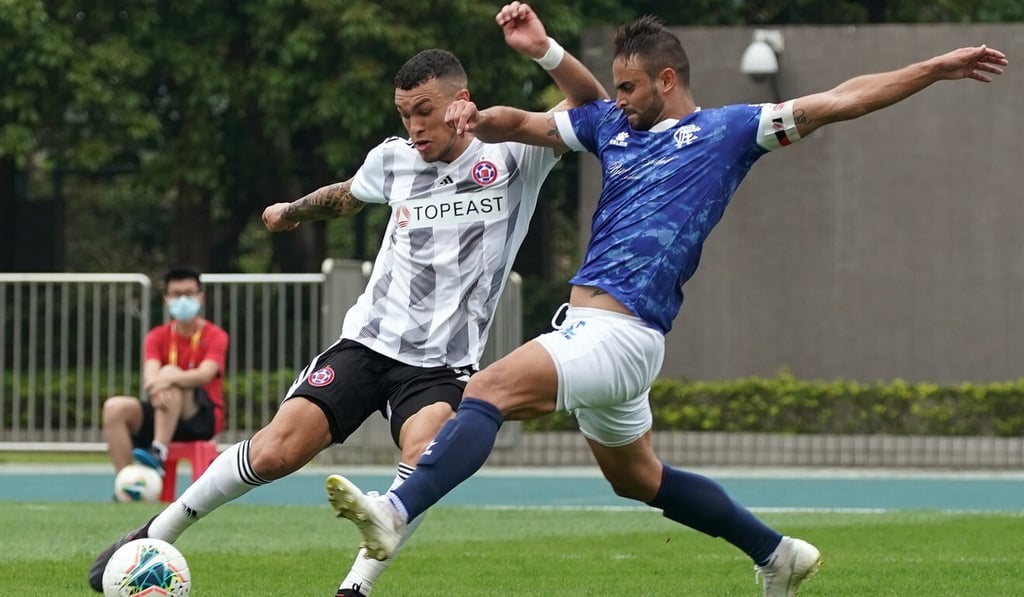 Everton Camargo of Eastern Long Lions is challenged by Tomas Maronesi of BC Rangers during the FA Cup last season. The cup competition has been cancelled to save time for the interrupted season. Photo: Felix Wong