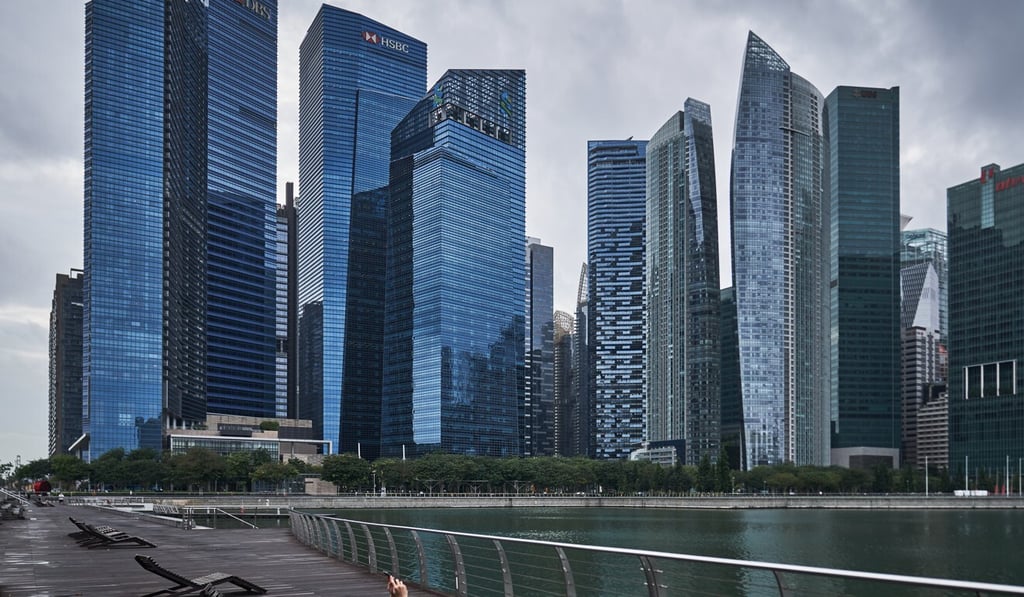 Banks and financial institutions are seen in the central business district of Singapore last month. Photo: Bloomberg Banks and financial institutions are seen in the central business district of Singapore last month. Photo: Bloomberg