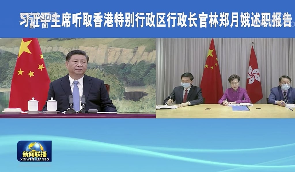 Hong Kong Chief Executive Carrie Lam held a virtual meeting with Chinese President Xi Jinping and Premier Li Keqiang on January 27. Photo: SCMP Pictures Hong Kong Chief Executive Carrie Lam held a virtual meeting with Chinese President Xi Jinping and Premier Li Keqiang on January 27. Photo: SCMP Pictures