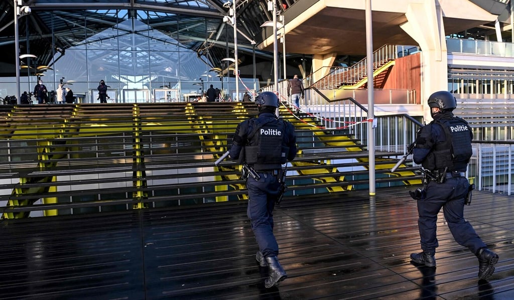 Heavily armed policemen patrol outside the Antwerp courthouse during the trial of four persons, including an Iranian diplomat, on February 4, 2021. Photo: AFP