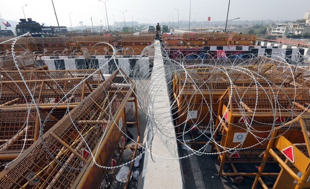 A view of barbed wire and barricades placed by security personnel near the site of a farmers’ protest at the Delhi Ghazipur Border near New Delhi. Photo: EPA-EFE A view of barbed wire and barricades placed by security personnel near the site of a farmers’ protest at the Delhi Ghazipur Border near New Delhi. Photo: EPA-EFE