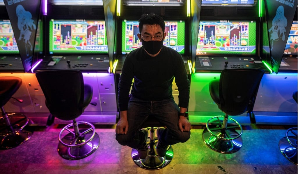 Yasushi Fukamachi, a manager at the Mikado game centre, says customers have stayed away despite anti-infection measures. Photo: AFP