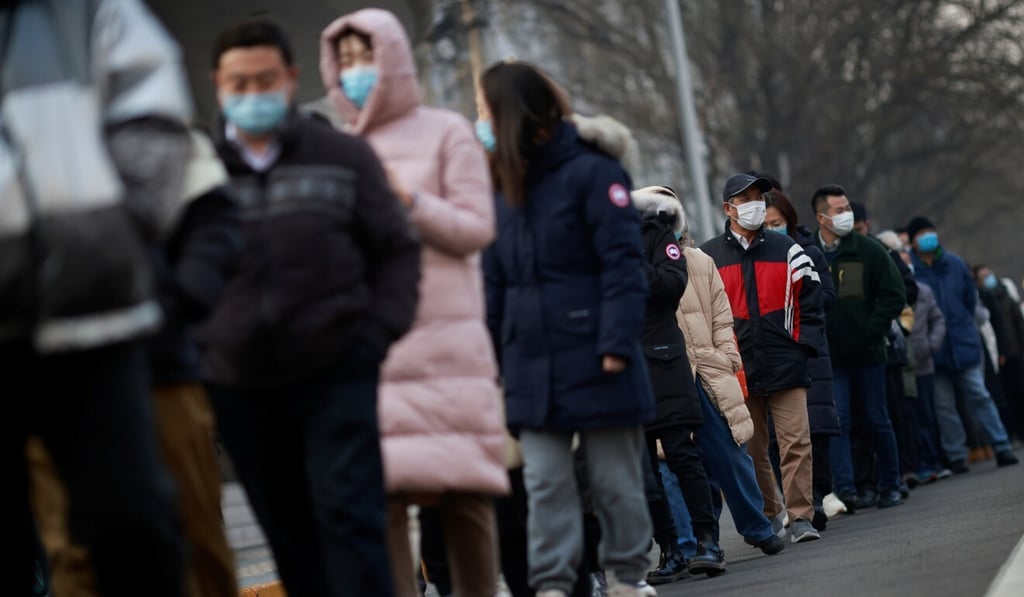 People line up at a mass testing site in Beijing in January. On-call testing means queues can be avoided. Photo: Reuters