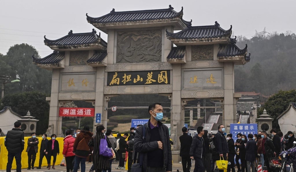 Wuhan residents visit Biandanshan cemetery on the first day of the Lunar New Year to remember those who have died in the last year. Photo: AFP