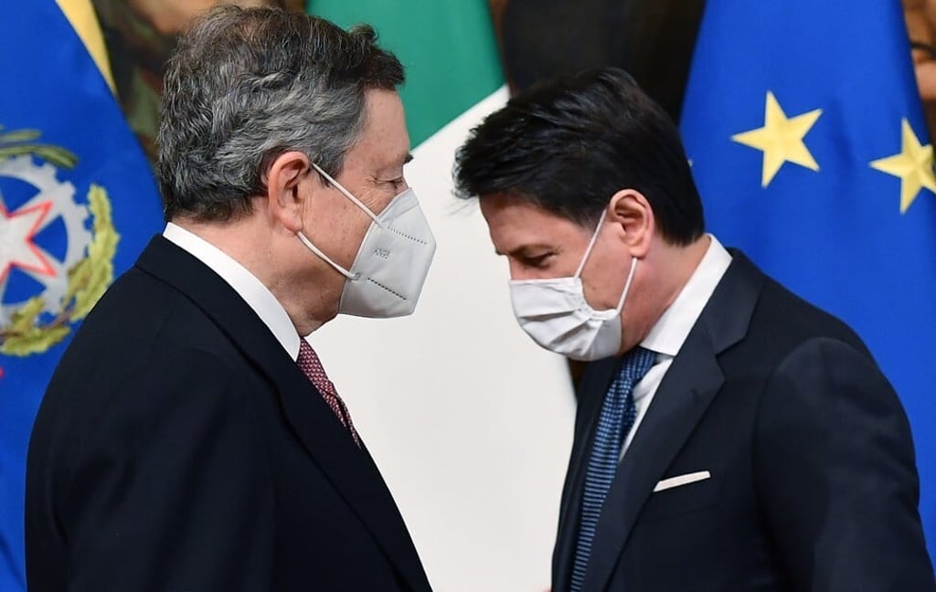 Italy’s new Prime Minister Mario Draghi, left, and outgoing prime minister Giuseppe Conte at Chigi Palace in Rome, Italy on Saturday. Photo: EPA-EFE Italy’s new Prime Minister Mario Draghi, left, and outgoing prime minister Giuseppe Conte at Chigi Palace in Rome, Italy on Saturday. Photo: EPA-EFE