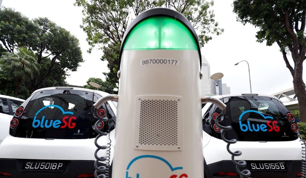 BlueSG electric car-sharing vehicles are parked at a charging station in Singapore. Photo: Reuters BlueSG electric car-sharing vehicles are parked at a charging station in Singapore. Photo: Reuters