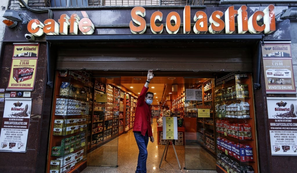 A coffee shop opens for takeaways in Rome, on May 4, 2020, after a two-month lockdown in Italy. Photo: AP